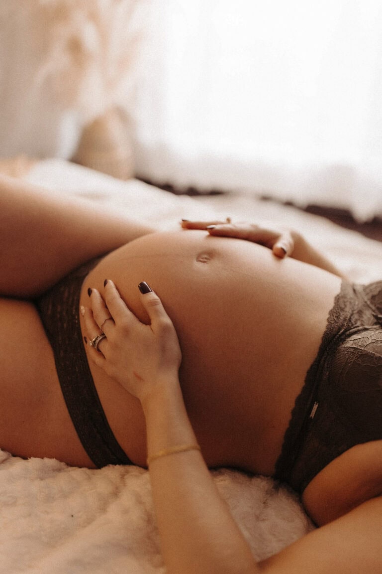 detail shot of pregnant belly